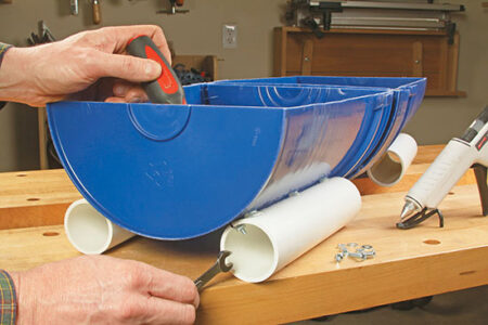 The PVC pipe adds stability to the base of the bucket.